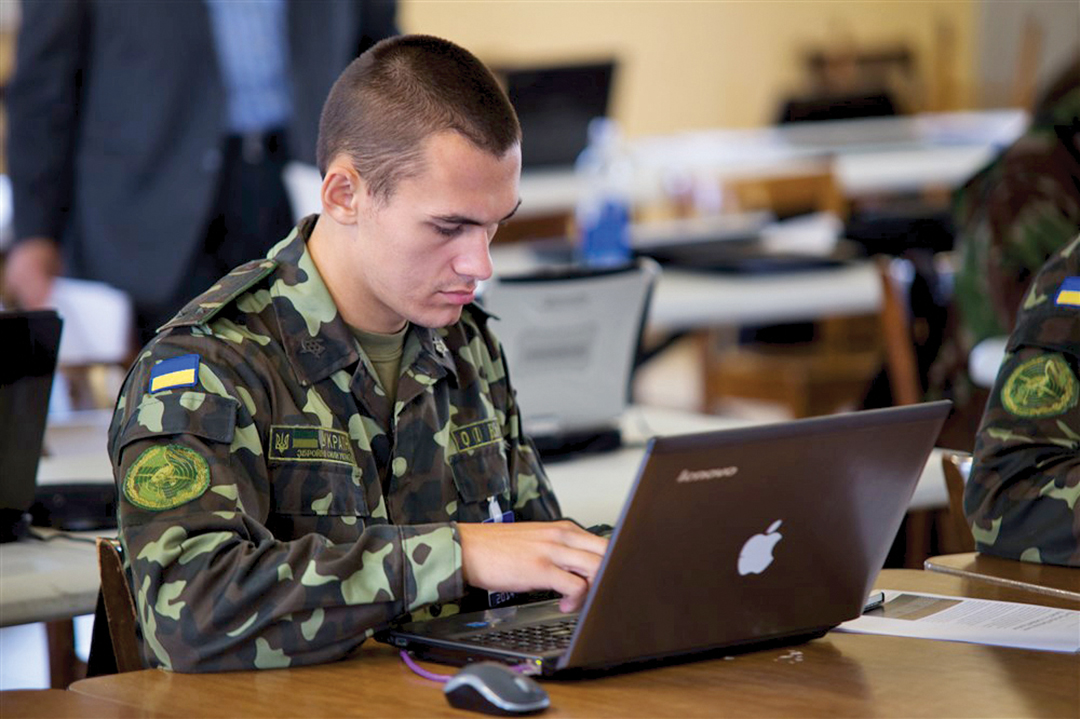 A Ukrainian soldier attends a 2014 Cyber Endeavor seminar, part of a U.S. European Command initiative to improve collective cyber security of NATO allies and partners. MAJ. JASON ROSSI/U.S. AIR FORCE